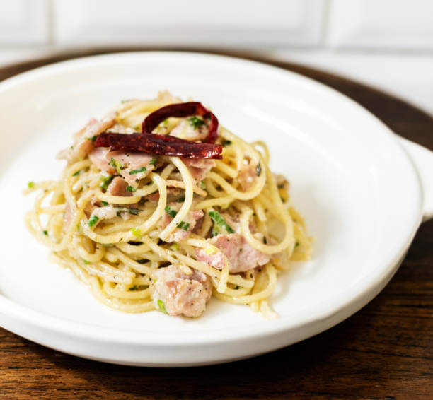 Al fresco dining and perfect Carbonara at Trattoria da Enzo al 29.