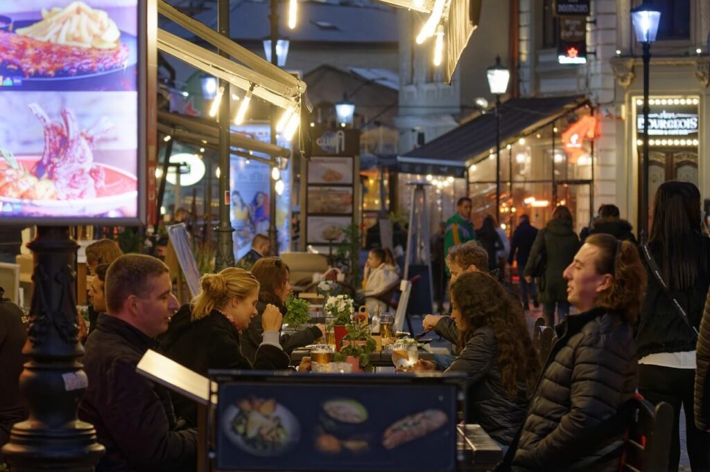 Lively evening in Trastevere Rome with outdoor cafes and lights