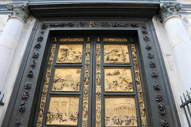 Bronze ‘Gates of Paradise’ doors of the Baptistery of St. John in Florence, decorated with Renaissance biblical reliefs.