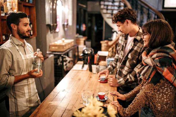 Locals standing at the bar drinking espresso in a traditional Roman café — experiencing authentic Italian coffee culture.