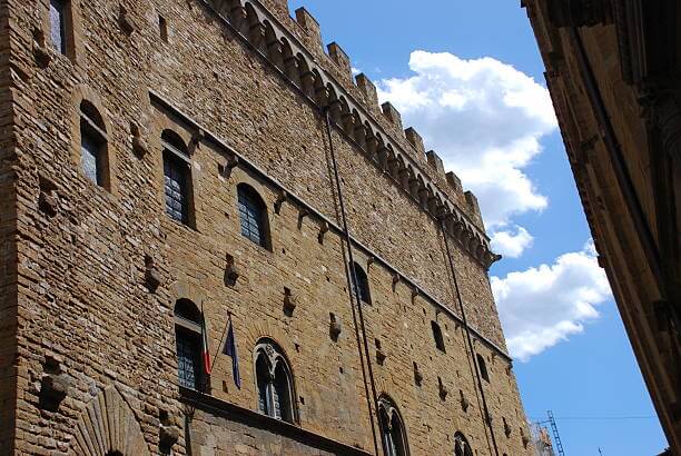 Tourist using Firenze Card to visit Florence Italy landmarks and museums.