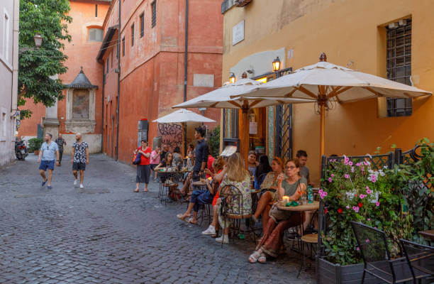 Pianostrada restaurant in Trastevere, Rome at night with outdoor dining and creative Italian cuisine