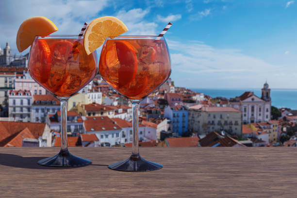 Aperol Spritz on a Roman rooftop terrace, offering a relaxing offbeat experience during a 2 Day Rome Itinerary 2025.