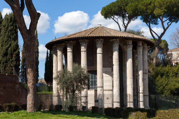 Temple of Hercules Victor with Corinthian columns near the Tiber River in Rome.