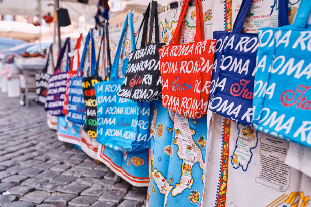 Quirky Roman-themed gifts and tote bags at Rome is More souvenir shop