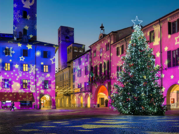 Christmas in Italy with festive lights in a historic piazza — magical winter travel in Italy
