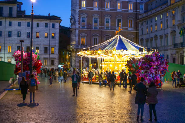 Christmas lights and holiday market stalls in Rome’s Piazza Navona.