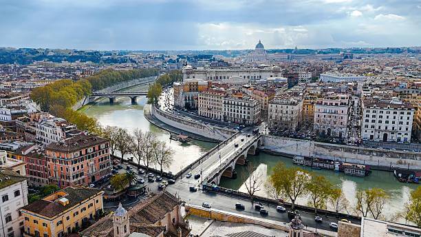 Rooftop view from Castel Sant’Angelo overlooking St. Peter’s Basilica and the Tiber River