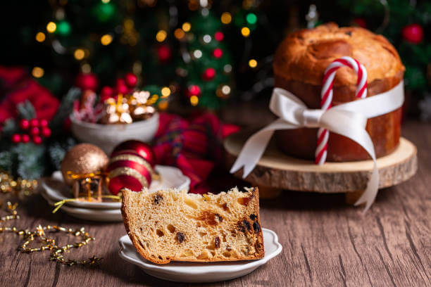 Traditional Italian Christmas food including Panettone, Pandoro, lasagna and tortellini in brodo