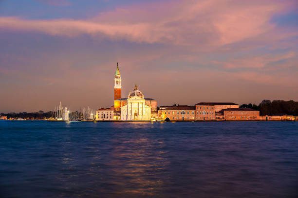 Sunset view of Venice skyline from San Giorgio Maggiore island Italy