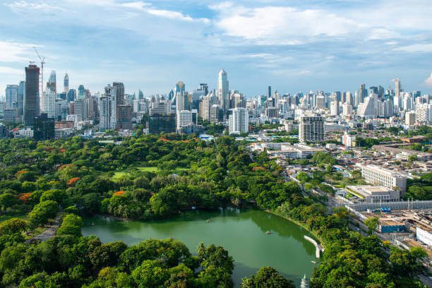Lumpini Park and Silom skyline Bangkok