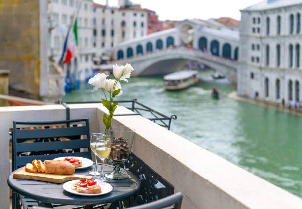 grand canal view from luxury hotel balcony Venice Italy
