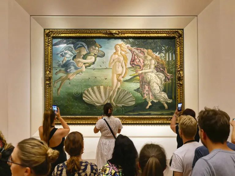 2 days in Florence solo traveler standing before Botticelli's Birth of Venus inside the Uffizi Gallery on a first full day in Florence
