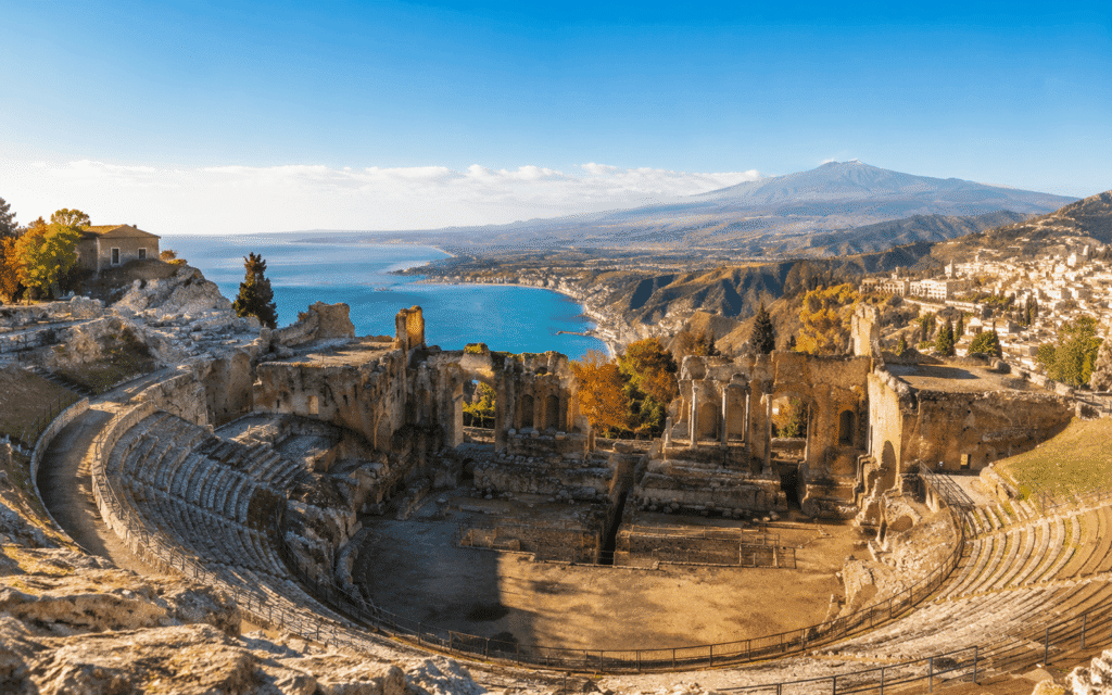 Sicily extension for Italy October itinerary Taormina Greek theatre overlooking turquoise sea with Mount Etna