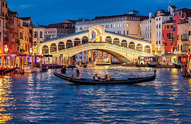 Venice Italy in October Itinerary Grand Canal with gondolas and golden afternoon light
