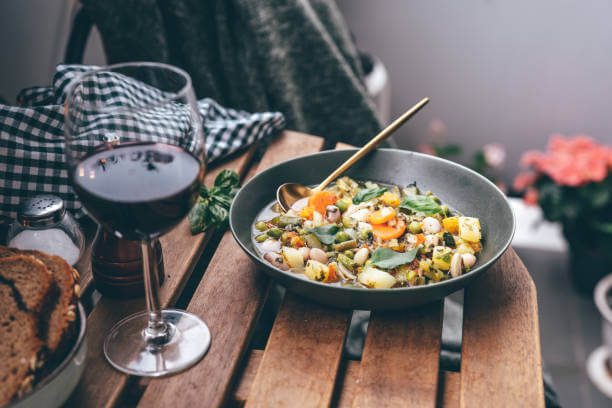 solo dining in Florence Florentine ribollita soup and a glass of Chianti Classico representing the ideal solo diner meal in autumn