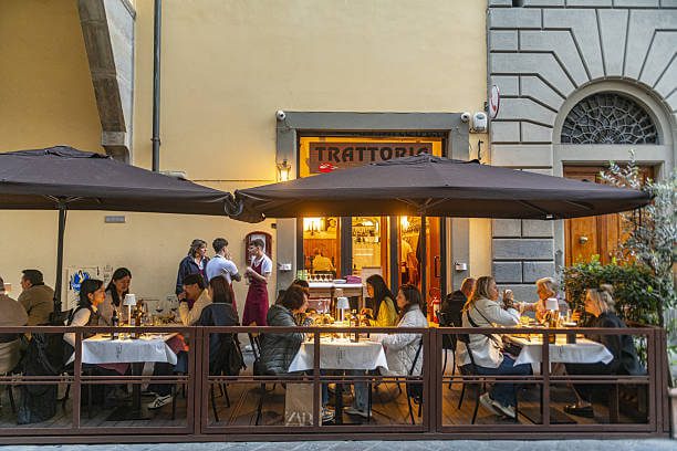solo dining in Florence Oltrarno trattoria with local Florentine diners and a solo traveller